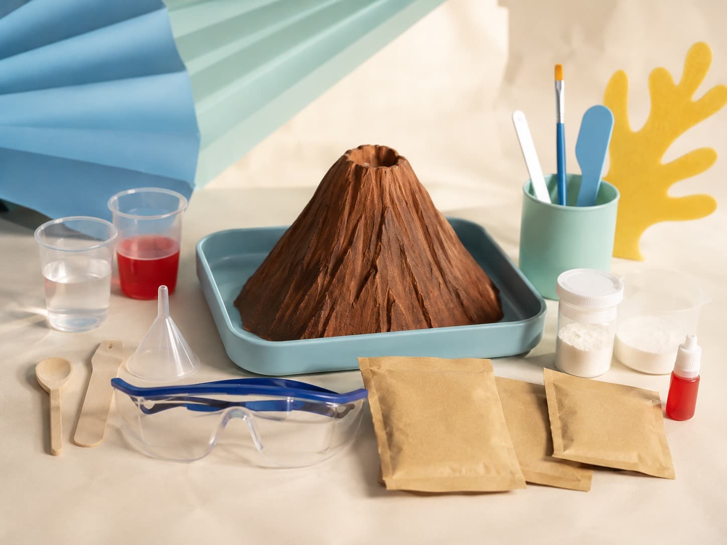 Volcano & Reaction Kit educational science kit arranged on a studio table